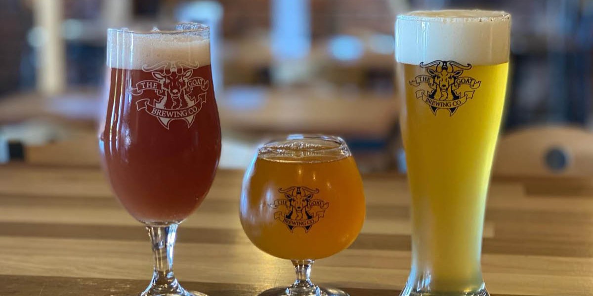 three glasses of beer on a table